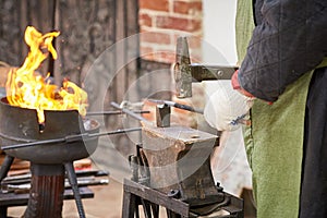 Closeup of a working blacksmith