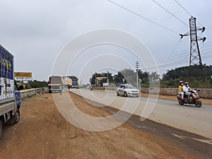 Closeup of working in Road construction work in Kadabagere Village rural India, This is rural infrastructure development project