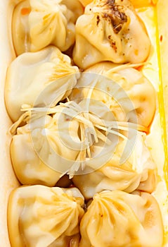 Closeup of Xiao Long Pao and ginger slide