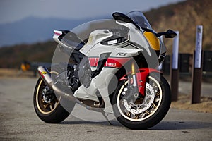 Closeup of a Yamaha YZF-R1 motorcycle on a road