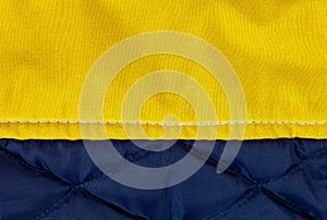 Closeup of a Yellow and Blue Down Jacket