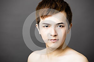 Closeup young asian handsome man face