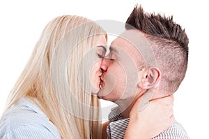 Closeup of young beautiful couple kissing