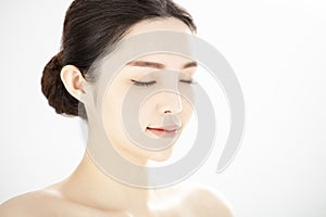 Closeup young beauty with healthy perfect skin over white background
