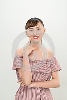 Closeup young smiling woman face isolated on white