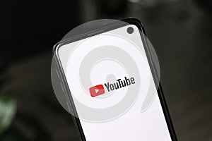 Closeup of Youtube logo on smartphone screen