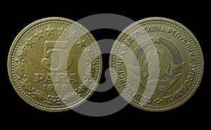 Closeup of Yugoslavian 5 dinar coin on a dark background