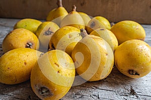 Closeupshot of yellow juicy pears on the wooden background