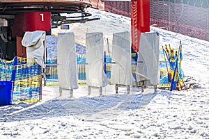 closing the entrance to the ski lift in the evening.