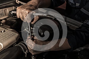 Clossup the dirty hands of a auto mechanic