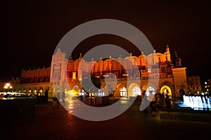 Cloth Hall on Rynek Glowny and fountain in Krakow