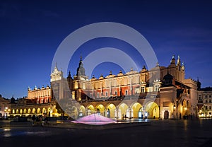 Cloth Hall Sukiennice building after sunset in Krakow city