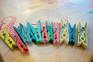 Cloth pins on wooden table