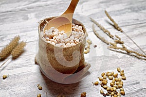 Cloth bag with chickpeas and spoon II photo