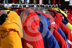 Coats on rack in shop photo
