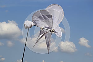 Cloth windmills with blue sky