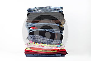 Clothes and accessories - group stack pile of colorfull jeans white background