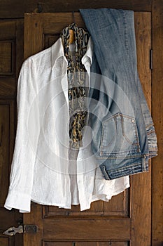 Clothes on antique cabinet