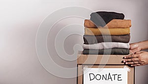 Clothes Donation, Renewable Concept.Box of Use Old Cloth