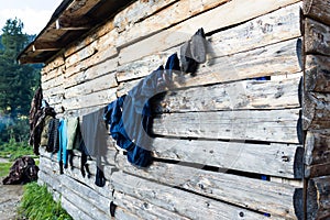 Clothes are dried on the wall