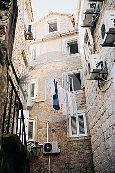 Clothes dry on the facade of an apartment building