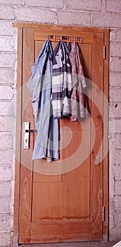 Clothes hanger on the back of the door