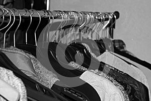 Clothes on a hanger. Black and white photo
