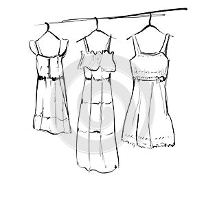 Clothes on hangers. Hand drawn sketch illustration. Dress