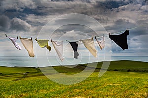 Clothes hanging on line photo