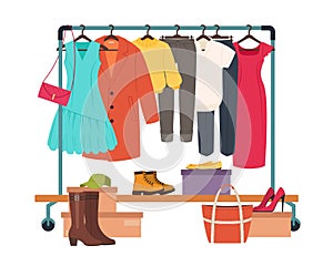 Clothes hanging on rack, garment rail with casual women clothing. Fashion girl wardrobe, female clothes on hangers