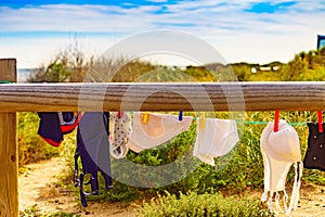 Clothes hanging to dry outdoor on beach