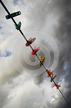 Clothes-line on the storm sky