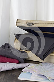 Clothes with an old, retro suitcase