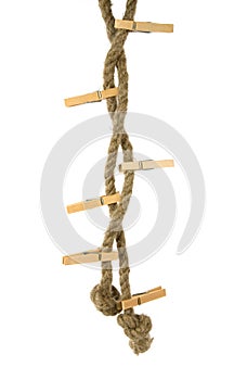 Clothes-peg and rope on white