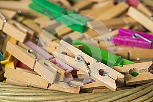 Clothes pegs made of wood and plastic colors