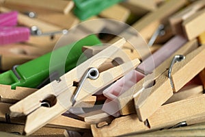 Clothes pegs made of wood and plastic colors