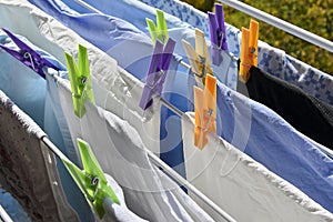 Clothes rack with towels and bedlinen drying