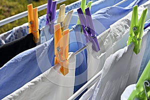 Clothes rack with towels and bedlinen drying