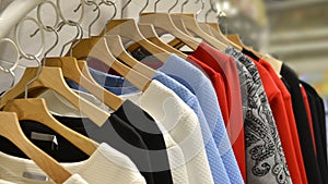 Clothes on racks in fashion shop,clothing store,clothes store,fashion shop