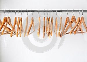 Clothes rail with wooden hangers