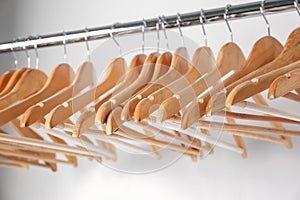 Clothes rail with wooden hangers