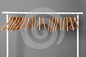 Clothes rail with wooden hangers