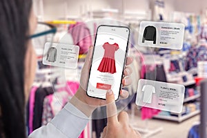 Clothes shop through a smartphone app with balloons arround suggesting clothing photo