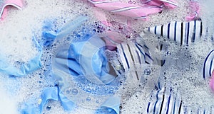 Clothes soak in powder detergent water dissolution. Laundry concept