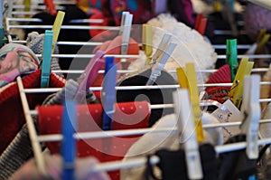 Clotheshorse with laundry and clothes pins photo