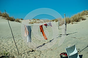 Clothesline with clothes hanging on the beach