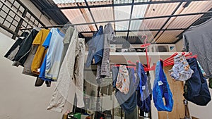 Clothesline in Indonesia where clothes are hung to dry during the daytime.