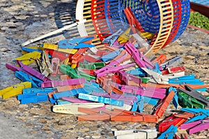 Clothespin in the basket stand on table in garden