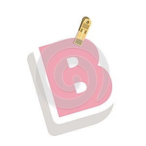 Clothespin holding relive letter B