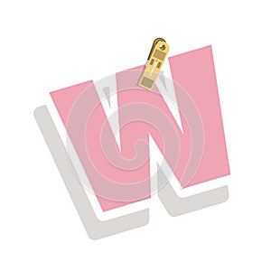 Clothespin holding relive letter w